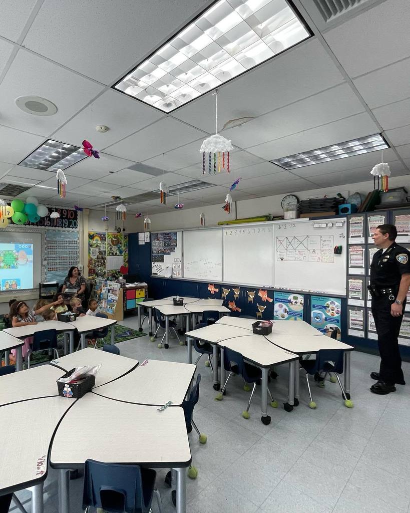 Chief Bermudez additionally talking to students in a classroom
